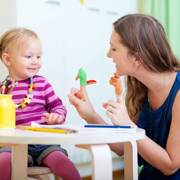 Mom & daughter playing with finger puppets